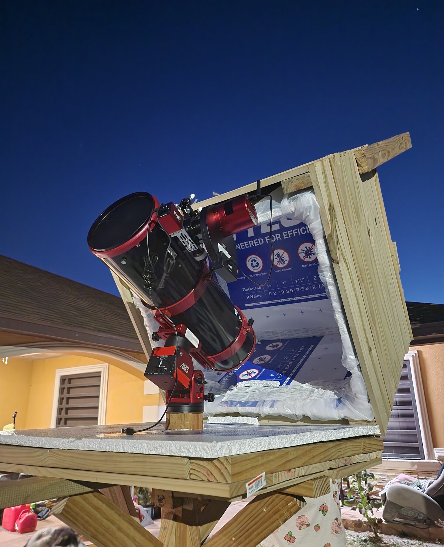 Alexander Mendoza's telescope inside his homemade observatory enclosure