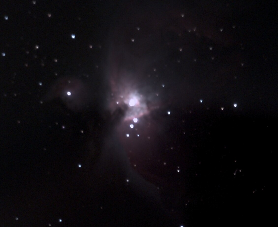 The Orion Nebula against a dark star field